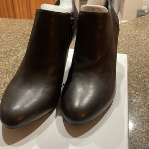 Brand new dark brown bootie. Never worn. Perfect condition